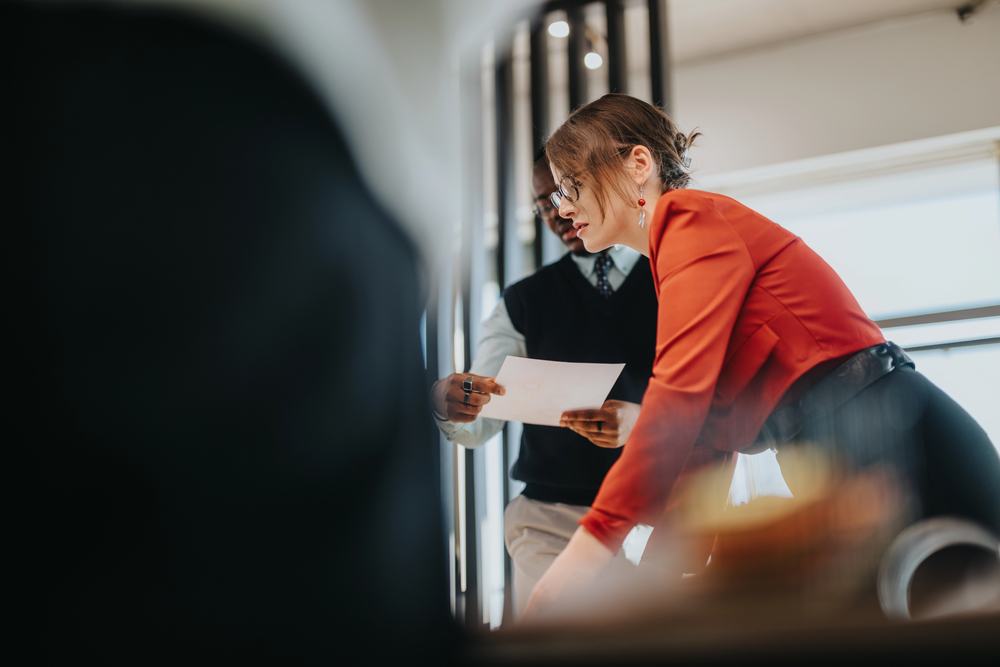 A Business Owner's Guide to a Practical Guide to Using image Business team building a long-term strategy of using AI in marketing