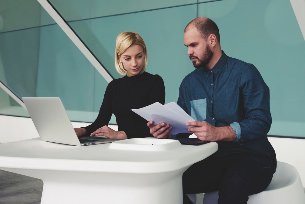 A Business Owner's Guide to a Practical Guide to Using image Colleagues studying AI-powered advertising campaigns